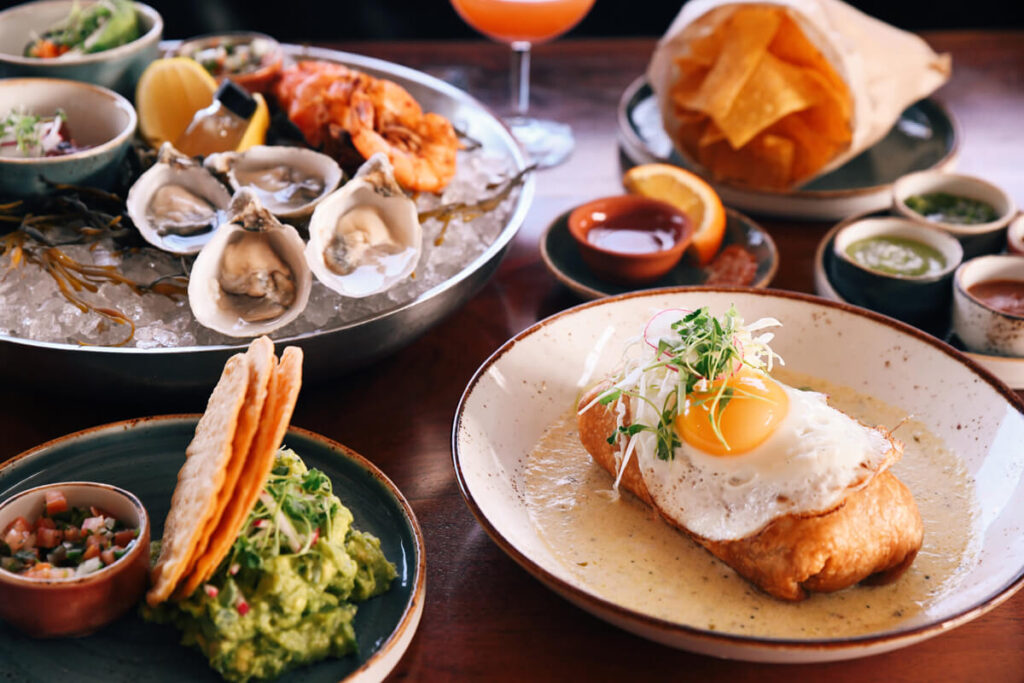 Mexican seafood spread with oysters, shrimp, and brunch plates